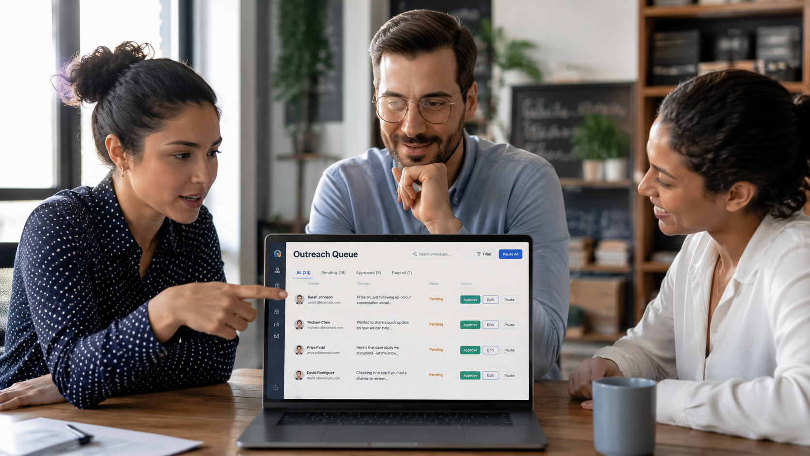 Team reviewing ReachOut outreach parameters — set the strategy once, the platform executes